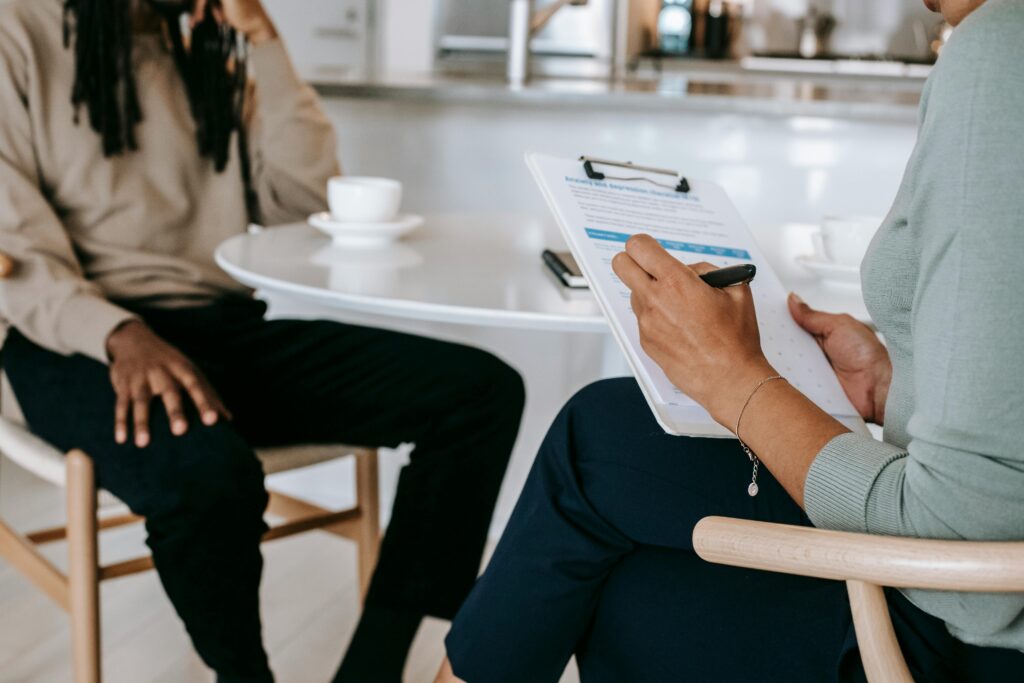 Two people having an interview | The Recruiting Squad